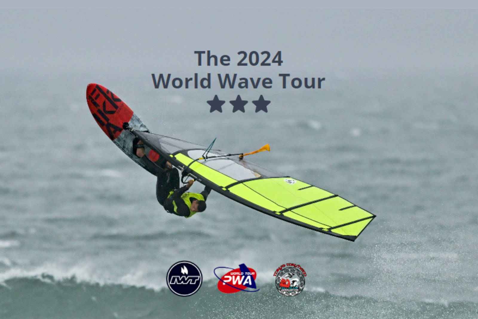 A windsurfer performs an aerial manoeuvre on a stormy sea, promoting the 2024 World Wave Tour event.